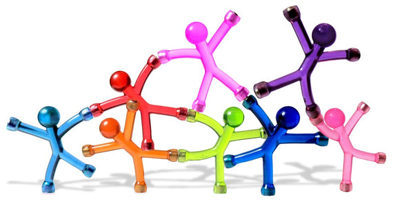 A colorful assortment of translucent plastic figures in various poses, showcasing their vibrant sea blue, pink, green, red, and yellow hues. This playful arrangement highlights the Mini QMan figures, emphasizing their fun and versatile design, perfect for both play and display.