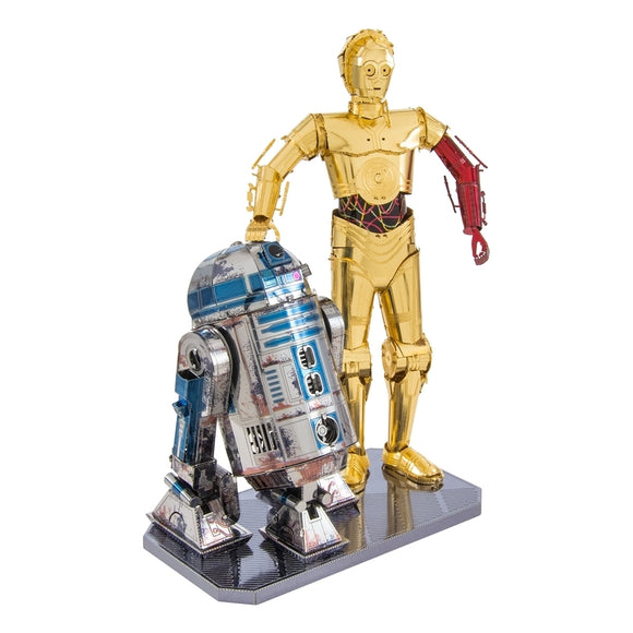 Metal Earth DIY kit featuring intricately detailed R2-D2 and C-3PO models. R2-D2 is in blue and silver, while C-3PO is in shiny gold, both standing on a sleek black base.