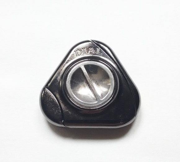 Close-up of the Hanayama Cast Dial mechanical puzzle featuring a shiny silver exterior shaped like a triangular dial. The surface reflects light, highlighting its sleek design.