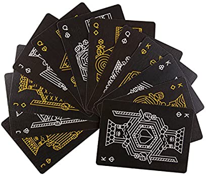 A fan of Killer Bees Playing Cards by Ellusionist, featuring intricate black and gold designs. The cards showcase unique bee-themed illustrations and ornate patterns, suitable for card games and magic tricks.