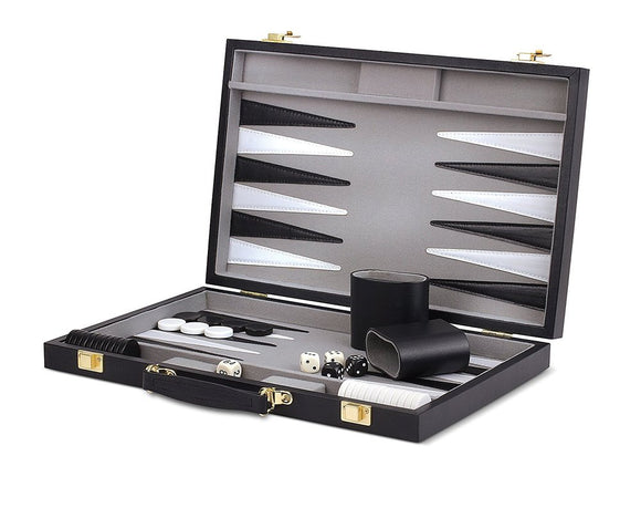 A stylish 15-inch black backgammon set by Wood Expressions Inc. The set is open, showcasing a smooth interior with black and white checker pieces, dice, and a comfortable wrist rest. The box features a sturdy design with gold fittings and ample storage for game components.
