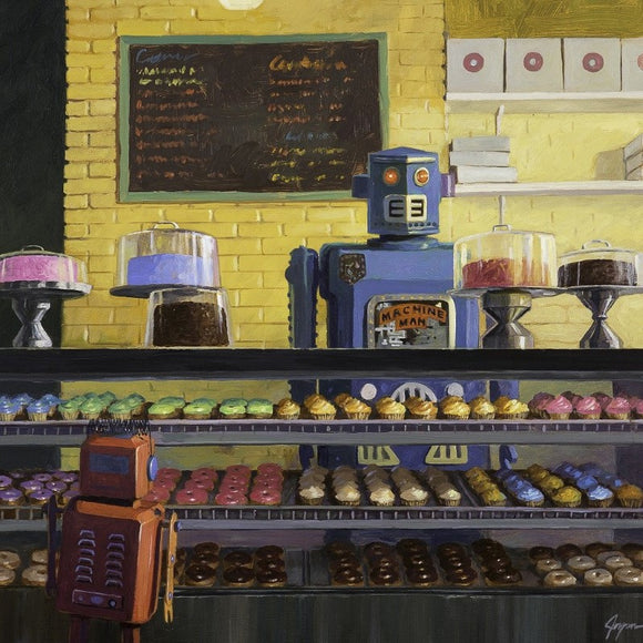 A colorful jigsaw puzzle titled 'Indecision' by Artifact Wooden Puzzles. The image features a whimsical scene of two robots in a bakery, one robot looking at various pastries displayed in a glass case, while the other robot stands behind the counter. The backdrop is a cheerful yellow wall with a chalkboard menu and shelves filled with more baked goods.