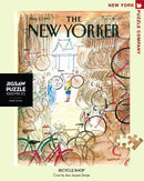 A colorful 1000-piece jigsaw puzzle titled 'Bicycle Shop' by New York Puzzle Company, featuring a whimsical illustration of a bicycle shop filled with various bicycles, tools, and vibrant colors. The design reflects the cover art by Jean-Jacques Sempé from The New Yorker dated August 1, 1988.
