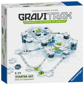 GraviTrax Starter Set by Ravensburger featuring an interactive track system. The packaging displays a complex track layout with over 100 components, including pathways and marbles, suitable for ages 8 and up. The design promotes creativity and STEM learning through gravity-powered gameplay.