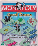 Monopoly: The Card Game by Winning Moves featuring vibrant graphics. The box displays the classic Monopoly logo and various game cards showcasing game elements. Ideal for quick, fun family game nights.