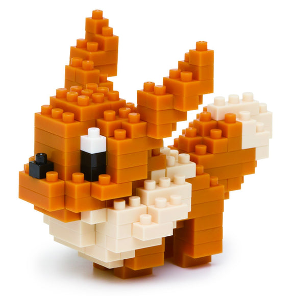 A colorful Nanoblock DIY kit featuring Eevee, a charming brown and cream Pokémon character crafted with small, interlocking building blocks. The design captures Eevee's playful expression and fluffy tail, perfect for collectors and enthusiasts of all ages.