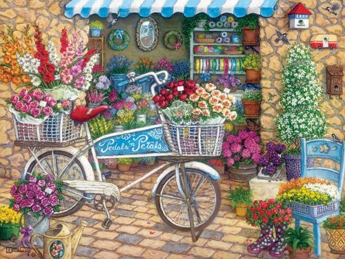 A captivating jigsaw puzzle titled 'Pedals 'n' Petals' featuring a charming bicycle adorned with colorful flower baskets in front of a quaint shop filled with various floral arrangements and gardening supplies. The scene is set on a cobblestone path, with vibrant blooms and a sunny atmosphere, inviting puzzle enthusiasts to immerse themselves in this delightful 275-piece challenge.