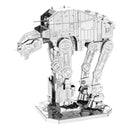 A detailed metal model of the AT-M6 Heavy Assault Walker, showcasing its intricate parts and structures. The model stands on a cracked base, reflecting a realistic design.