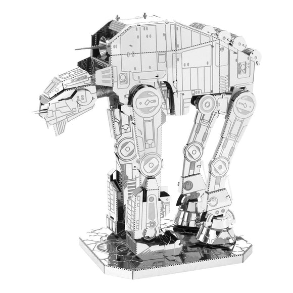 A detailed metal model of the AT-M6 Heavy Assault Walker, showcasing its intricate parts and structures. The model stands on a cracked base, reflecting a realistic design.