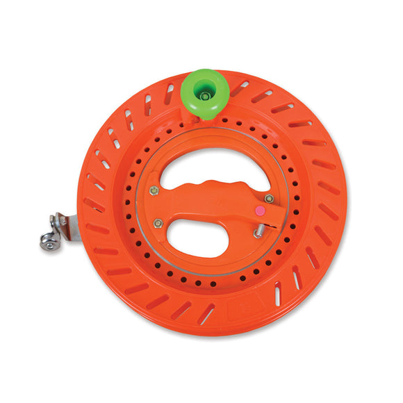 Speedy Winder 9" by PREMIER Kites, a bright orange circular tool with a textured handle and a green top. Ideal for easily winding strings and lines for kites and other outdoor activities.