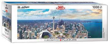 A panoramic jigsaw puzzle featuring a stunning aerial view of Toronto, Canada. The puzzle contains 1000 pieces and showcases iconic landmarks like the CN Tower and waterfront. The packaging displays a vibrant image, inviting puzzle enthusiasts to explore the beauty of Toronto.