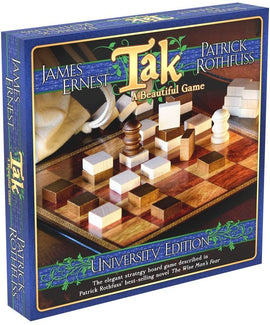 The Tak game box featuring an intricate design and wooden pieces displayed on a beautiful game board. The box cover shows the title 'Tak' with 'A Beautiful Game' subtitle, and includes references to authors James Ernest and Patrick Rothfuss, highlighting it as the University Edition inspired by 'The Wise Man's Fear'.