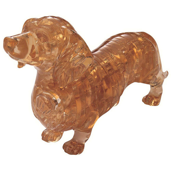 A 3D crystal jigsaw puzzle of a Dachshund, featuring intricate layering and a glossy amber finish. The puzzle pieces fit together to form a lifelike, three-dimensional representation of the beloved dog breed. Ideal for both puzzle enthusiasts and dog lovers, this decorative piece showcases craftsmanship and creativity.