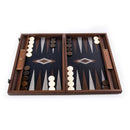 19-inch Backgammon board made of fossil forest wood, featuring a striking black playing surface with decorative diamond patterns and contrasting white and black playing pieces. The board is designed for two players and showcases elegant craftsmanship.