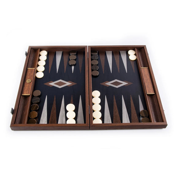 19-inch Backgammon board made of fossil forest wood, featuring a striking black playing surface with decorative diamond patterns and contrasting white and black playing pieces. The board is designed for two players and showcases elegant craftsmanship.