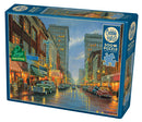 A Grand Night in Steubenville jigsaw puzzle by Cobble Hill featuring a nostalgic street scene illuminated by neon signs. The puzzle box showcases a vibrant, artistic illustration depicting a rainy night with vintage cars on the road, creating a warm, inviting atmosphere for puzzle enthusiasts.