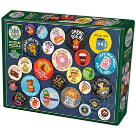 Cobble Hill 1000-piece jigsaw puzzle featuring a whimsical collection of colorful buttons with humorous phrases and cartoon characters. The box showcases a variety of button designs including food-themed puns and playful images, perfect for puzzle enthusiasts looking for a fun challenge.