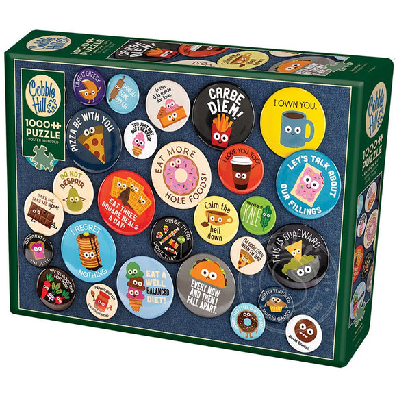 Cobble Hill 1000-piece jigsaw puzzle featuring a whimsical collection of colorful buttons with humorous phrases and cartoon characters. The box showcases a variety of button designs including food-themed puns and playful images, perfect for puzzle enthusiasts looking for a fun challenge.