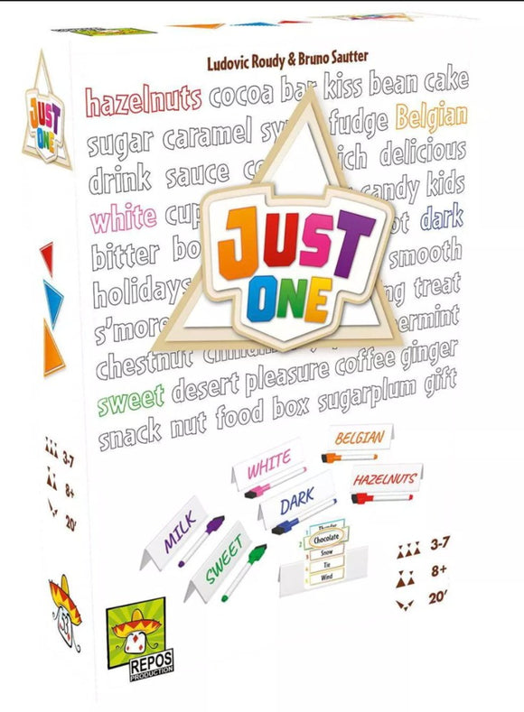 The Just One game box designed by Ludovic Roudy and Bruno Sautter features vibrant graphics and colorful keywords associated with flavors such as hazelnuts, chocolate, and sweets. The triangular packaging is decorated with information on the number of players (3-7), recommended age (8+), and playing time (20 minutes). There are markers included for gameplay.