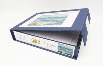 Artifact Wooden Puzzles jigsaw puzzle featuring 'Sea at Saint-Maries' by Van Gogh. The puzzle comes in a stylish blue box, showcasing a beautiful seascape artwork. Ideal for art lovers and puzzle enthusiasts.