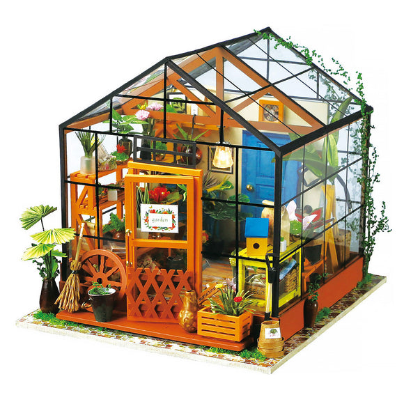 Cathy's Flower House Model Kit by Robotime, featuring a detailed greenhouse with vibrant plants, a blue door, and rustic decorations. Perfect for DIY enthusiasts, this kit includes miniature gardening tools and accessories, creating a charming floral display.