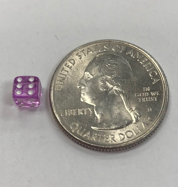 A close-up image of a micro purple dice with white pips, positioned next to a United States quarter coin for scale. The die is small, emphasizing its unique size and design.