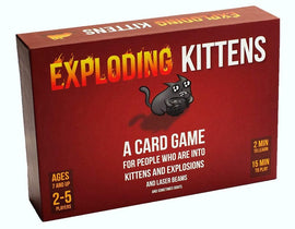Exploding Kittens is a fun and quirky card game featuring a playful cartoon cat with a grenade, set against a fiery red background. The box highlights that it is suitable for ages 7 and up and can accommodate 2-5 players. It emphasizes a quick learning time of just 2 minutes and a gameplay duration of 15 minutes, making it perfect for parties or family gatherings.