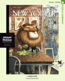 A 500-piece jigsaw puzzle titled 'A New Leaf' featuring a whimsical illustration of a lion at a café table surrounded by vegetables and art on the walls. The puzzle is designed by Peter de Sève and made by New York Puzzle Company. The package includes a puzzle piece image on a light green background with the name of 'The New Yorker' magazine displayed at the top.