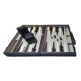 Leatherette backgammon game set featuring an 18-inch foldable board. The board displays alternating light and dark spaces, with black and white checkers, two dice, and a dice cup. Perfect for stylish gameplay and family fun.