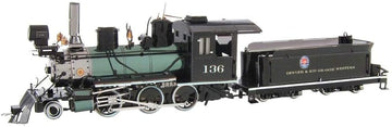 The Metal Earth 2-6-0 Locomotive DIY kit from Fascinations is a detailed metal model featuring intricately designed parts. It showcases a classic steam locomotive with a green and black finish, including visible wheels, chimney, and smokestack. The model is a perfect blend of artistry and engineering, ideal for hobbyists and collectors alike looking to assemble a miniature train.