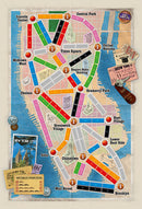 A colorful game board for Ticket to Ride: New York, featuring a map of New York City with iconic landmarks like Times Square, Lincoln Center, and Central Park. The paths are marked with various colored train routes and there are game pieces like transit tickets scattered on the edges, emphasizing the game's strategic gameplay and urban theme.