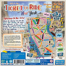 Back cover of the Ticket to Ride: New York board game by Days of Wonder. The design features a colorful illustrated map of New York City, showcasing important locations such as the Empire State Building and Central Park. Various game components are depicted, including destination tickets and train cards, alongside details about gameplay. Ideal for 2-4 players aged 8 and above, this fast-paced game explores the iconic sights of New York in the 1960s.