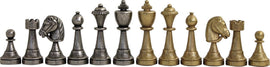 A display of Metal Staunton chessmen with a 2.75-inch king. The set features intricate detailing, with alternating silver and gold-tone pieces including pawns, rooks, knights, bishops, a queen, and a king. Each piece showcases a classic Staunton design, making it a luxurious addition to any chess game.
