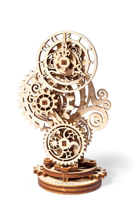 The UGears 3D Steampunk Clock is a beautifully crafted mechanical puzzle made of light wood. It features intricate gears and clock hands combining steampunk aesthetics with playful functionality. The design showcases swirling shapes and detailed carvings, offering an engaging DIY experience as users assemble this unique clockwork model.