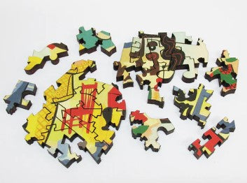Colorful jigsaw puzzle pieces from the Jazz Quintet by Jim Flora. The pieces feature vibrant artwork with abstract designs, depicting musical instruments and artistic patterns, showcasing the creativity of Artifact Wooden Puzzles.