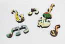 Colorful jigsaw puzzle pieces from the 'Jazz Quintet' by Jim Flora, featuring musical notes and instruments. The pieces exhibit intricate designs inspired by jazz music.