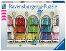 The Ravensburger jigsaw puzzle titled 'Fantastic Fashionist' features a whimsical illustration of a girl in a blue dress admiring colorful clothes arranged in elegant wardrobes. The puzzle contains 1000 pieces and showcases vibrant hues such as pink, red, green, yellow, and blue, creating a visually striking and playful scene perfect for fashion lovers and puzzle enthusiasts alike.