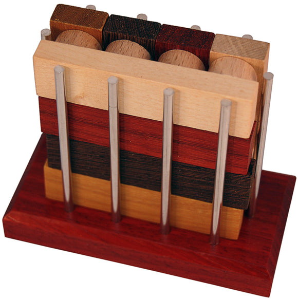 The 8 Balken by Jean-Claude Constantin is a beautifully crafted mechanical puzzle featuring colorful wooden blocks stacked vertically on a sturdy base. The puzzle incorporates metallic rods for tackling intricate challenges, making it an engaging and visually appealing brain teaser for enthusiasts.