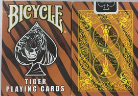 A deck of Bicycle Tiger Playing Cards featuring a striking black tiger image on the front, set against a vibrant orange and black striped background. The back design showcases intricate yellow illustrations with whimsical characters, offering a unique and captivating look for card enthusiasts and collectors.