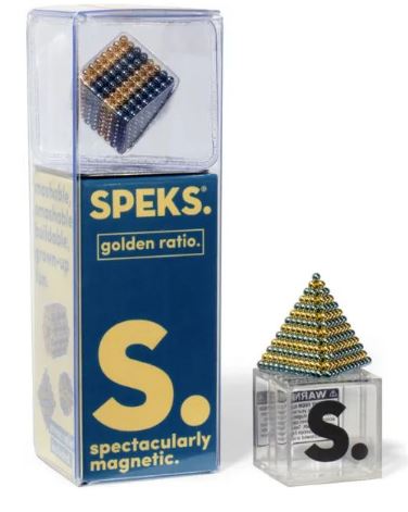 The Speks Stripes Golden Ratio is a set of magnetic spheres displayed in a clear packaging. It features a pyramid made from tiny spherical magnets that can be manipulated into various shapes and structures, emphasizing creativity and magnetism. The packaging has vibrant colors with the SPEKS logo and details about the product's features.