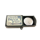 The Wizard's Magic Drawer by House of Marbles features a vintage-style box with intricate lettering and design. The drawer is slightly open, revealing a shiny, round coin marked with '10'. This playful and enchanting item is perfect for magic shows and party tricks.