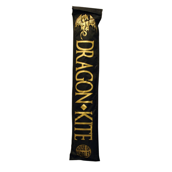 Dragon Kite from House of Marbles features a striking design with a dragon motif. The product packaging is sleek and black with bold, golden text. Perfect for outdoor fun and adventures, this kite is designed to capture the imagination while soaring high in the sky.