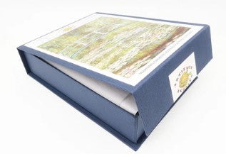 Artifact Wooden Puzzles Monet Bridge jigsaw puzzle, featuring a beautifully designed, sturdy box showcasing the famous Monet painting of a bridge over water. Ideal for art lovers and puzzle enthusiasts alike, this puzzle offers a captivating challenge with high-quality wooden pieces.