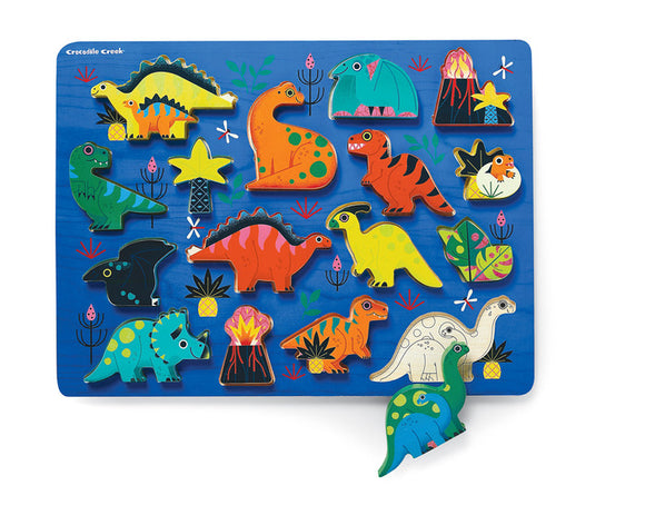 Colorful wooden jigsaw puzzle featuring various dinosaur shapes set against a vibrant blue background. The puzzle includes 16 unique dinosaur pieces like a T-Rex, brontosaurus, and a stegosaurus among fun elements like plants and volcanoes, designed for children’s imaginative play and learning.