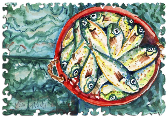 A colorful jigsaw puzzle titled 'Bucket o' Fish' from Artifact Wooden Puzzles. The puzzle features a beautifully illustrated bowl filled with various fish, painted in vibrant watercolors. The edges of the puzzle pieces are irregular and shaped, enhancing the visual appeal. The background has a leafy green pattern, giving a natural setting to the artwork.