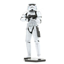 The ICONX: Stormtrooper by Fascinations is a detailed metal model kit depicting a Stormtrooper from the Star Wars franchise, featuring intricate design and metallic finish. The figure stands in a dynamic pose, holding a blaster, with visible details such as armor plating and weaponry, ideal for display or crafting.