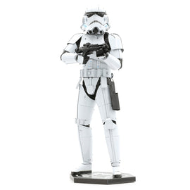 The ICONX: Stormtrooper by Fascinations is a detailed metal model kit depicting a Stormtrooper from the Star Wars franchise, featuring intricate design and metallic finish. The figure stands in a dynamic pose, holding a blaster, with visible details such as armor plating and weaponry, ideal for display or crafting.