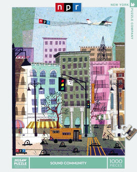 NPR: Sound Community Jigsaw Puzzle featuring a vibrant and colorful illustration of a cityscape with buildings, traffic lights, and people walking. The artwork is playful and reflects a lively urban environment, capturing the essence of community life. The puzzle consists of 1000 pieces and is made by New York Puzzle Company.