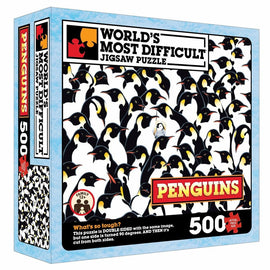 The Penguins jigsaw puzzle by TDC Games Inc features a challenging double-sided design with the same image of penguins. The box includes 500 pieces, with one side rotated 90 degrees for added difficulty. The colorful box prominently displays the title and highlights the puzzle's uniqueness.