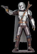 A detailed DIY metal model kit of The Mandalorian from the popular Star Wars series. The figure features a silver helmet, armor, and a cape, aiming with a blaster in one hand, showcasing intricate designs and sturdy materials. Perfect for fans and collectors, the model captures the essence of the iconic character.